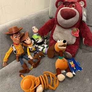 Toy Story Woody pull toy and Woody, Buzz, Lotso and Slinky dog plush bundle set